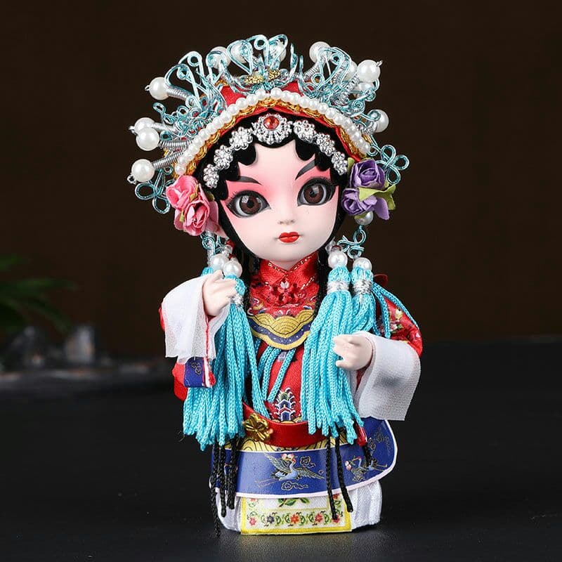 中国風京劇の人物の隈取り北京の記念品の絹人形が飾られています2