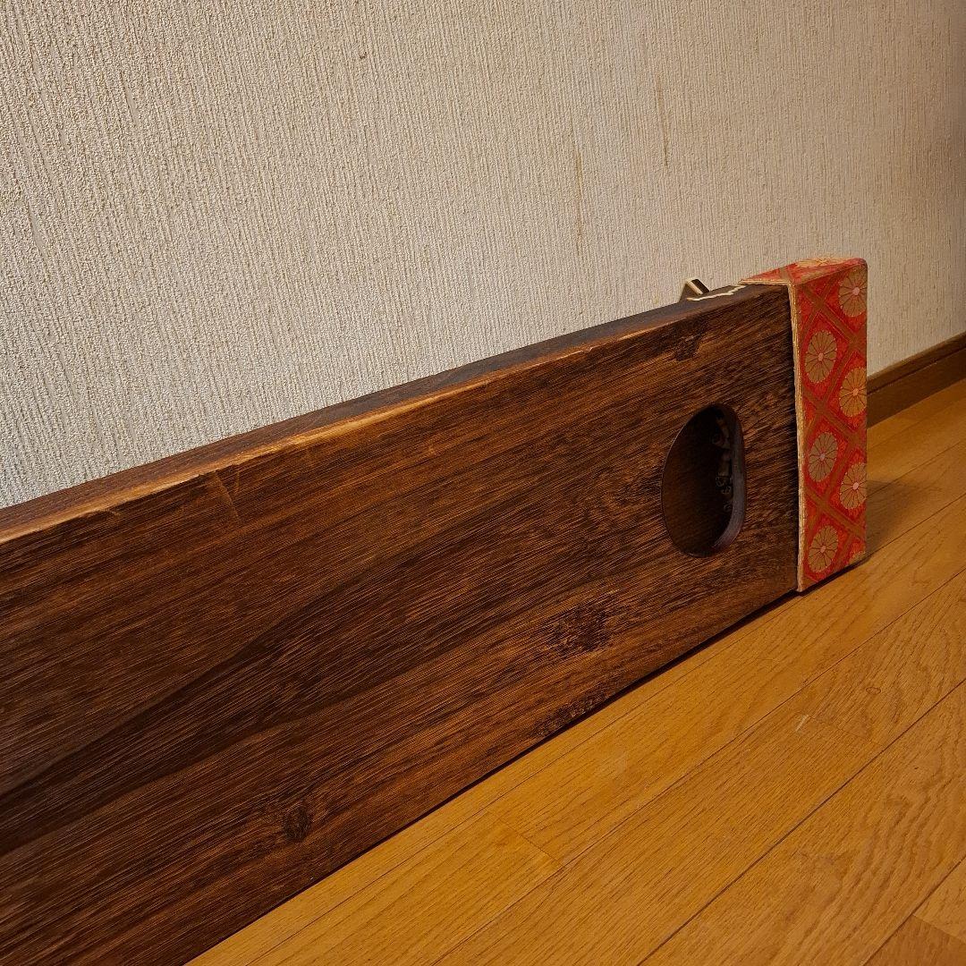 オレンジ色の鶴模様の袋つき　　　お琴