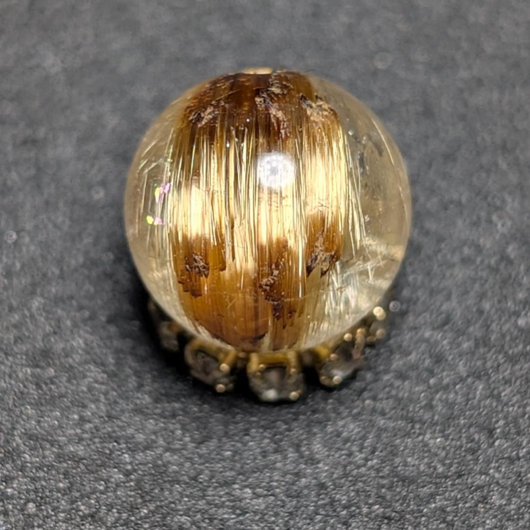 シャトヤンシー効果が出ている キャッツアイルチルクォーツ 8ミリ 粒売り 一点物