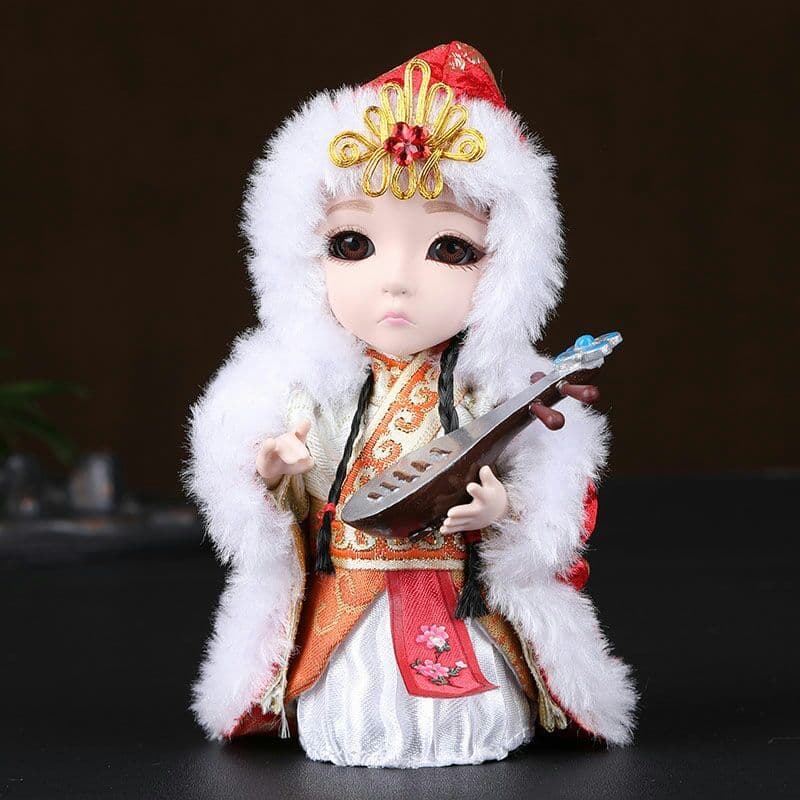 中国風京劇の人物の隈取り北京の記念品の絹人形が飾られています3