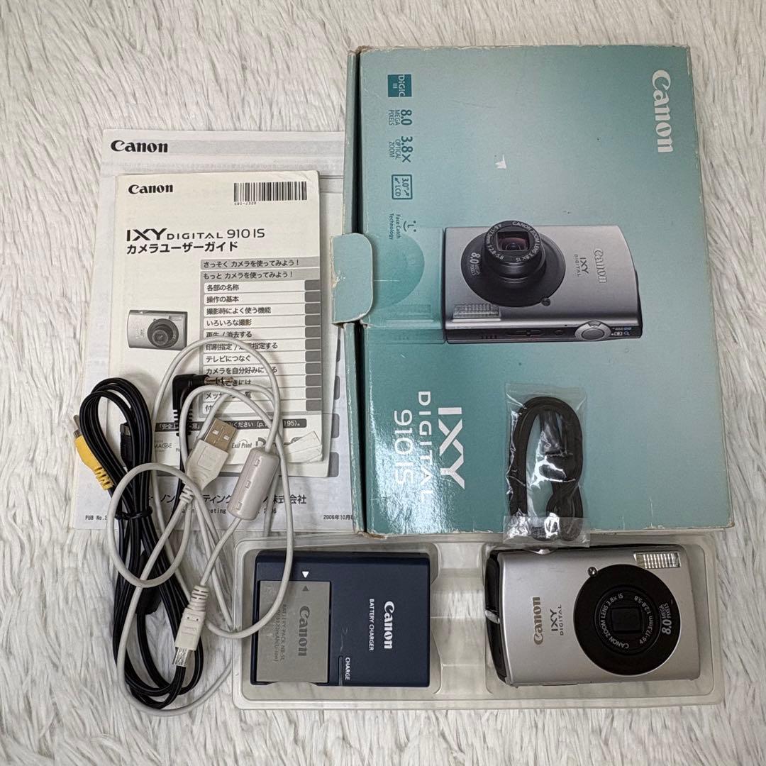Canon カメラ　IXY 910IS PC1249 充電器　箱 コンデジ　可動
