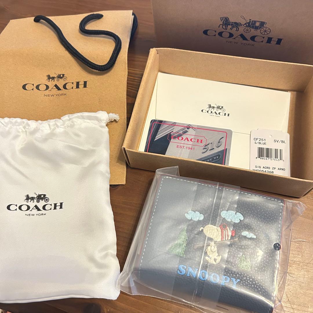 超大人気❤️COACH × PEANUTS スヌーピー コラボ 二つ折り財布