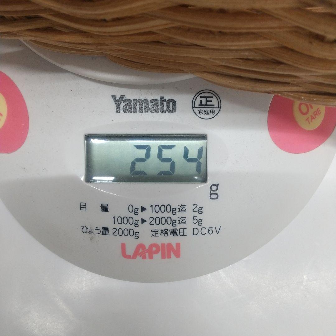 ベージュの天然素材かごバッグ「手づくりのため現品限り」
