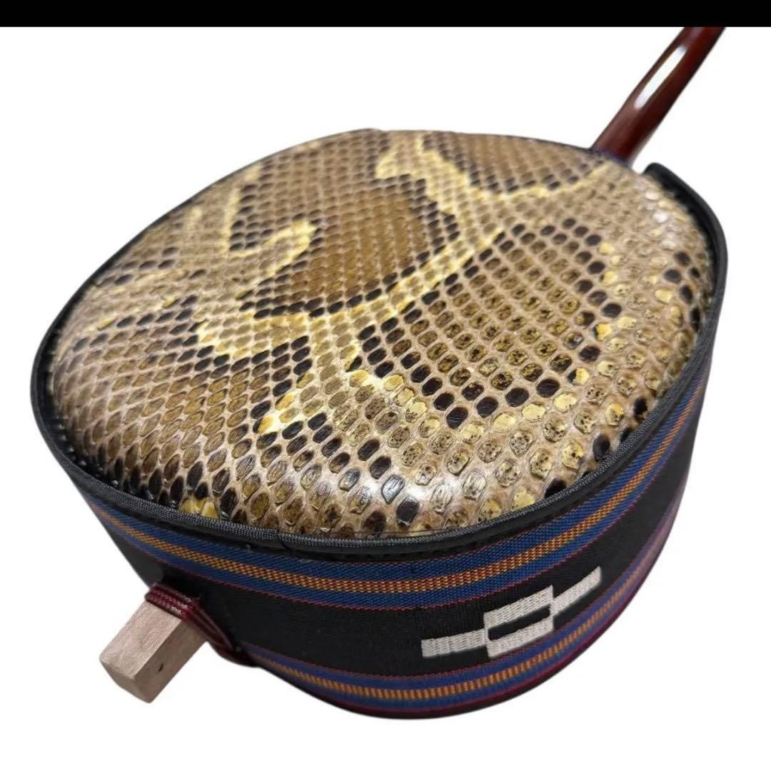 新城慎幸作 三線 紅木棹 本皮強化張り 保証書付 ハードケース付 沖縄三線