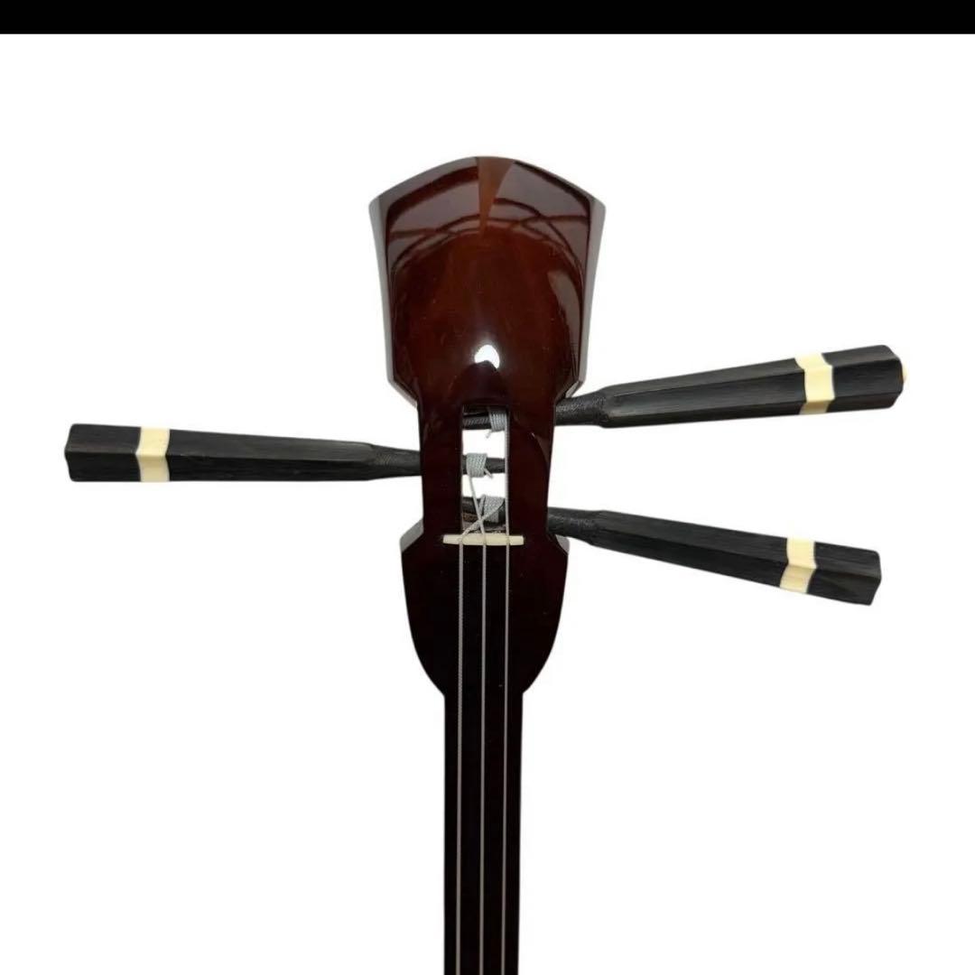 新城慎幸作 三線 紅木棹 本皮強化張り 保証書付 ハードケース付 沖縄三線