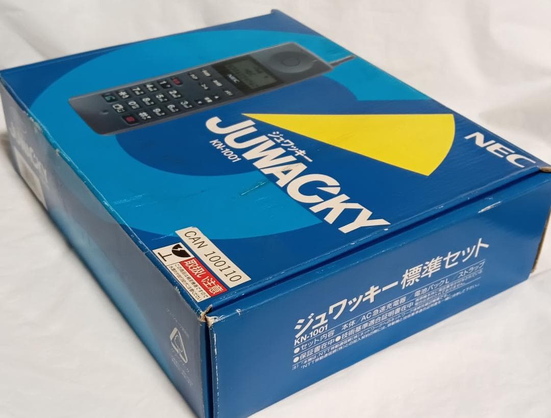 ●●NEC KN-1001 携帯電話本体 充電スタンド付き、通電確認済み●●