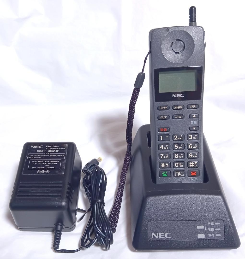 ●●NEC KN-1001 携帯電話本体 充電スタンド付き、通電確認済み●●