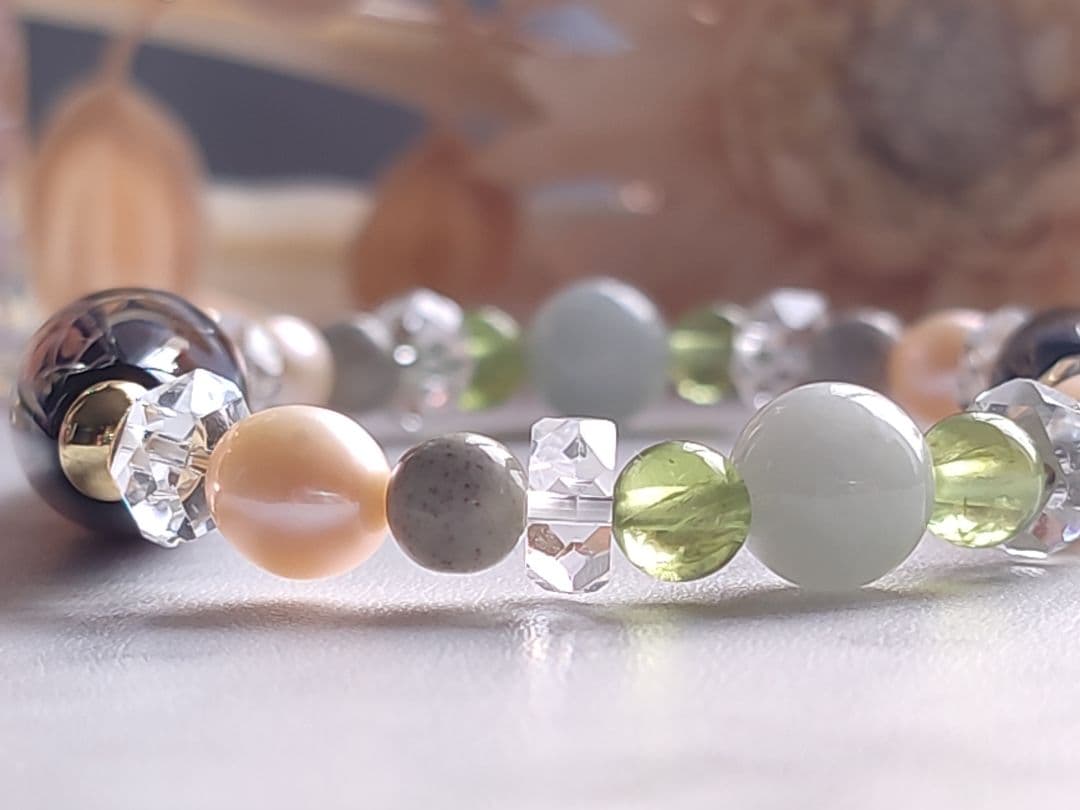 ◇至純 観音如意天珠と白蛇天珠・北投石・翡翠・ペリドットのパワーストーン ブレス