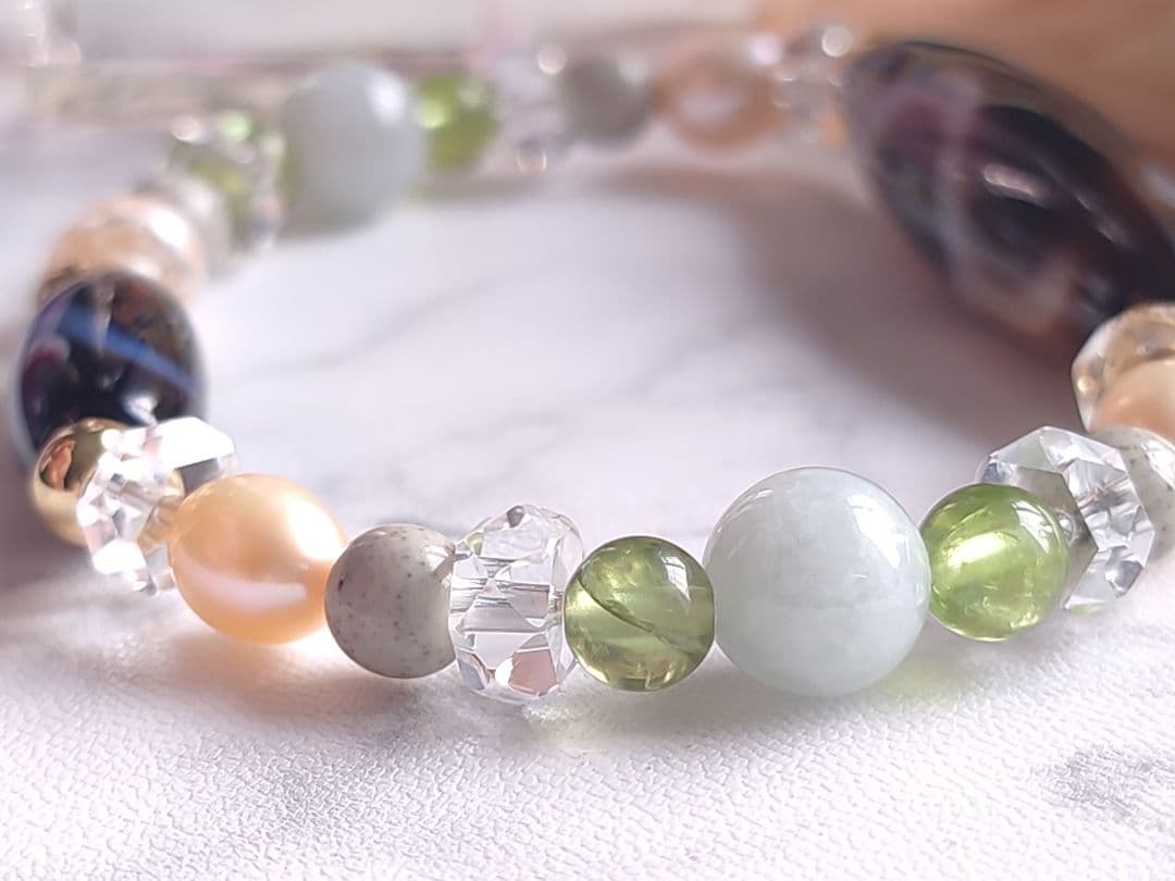 ◇至純 観音如意天珠と白蛇天珠・北投石・翡翠・ペリドットのパワーストーン ブレス