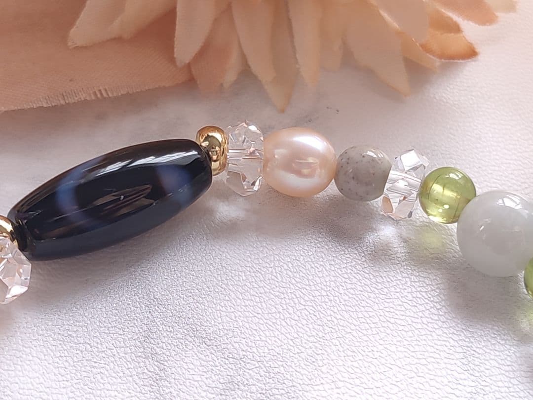 ◇至純 観音如意天珠と白蛇天珠・北投石・翡翠・ペリドットのパワーストーン ブレス