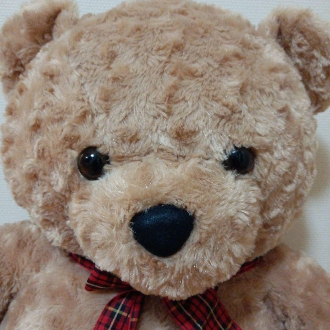 茶色のぬいぐるみ チェック柄リボン