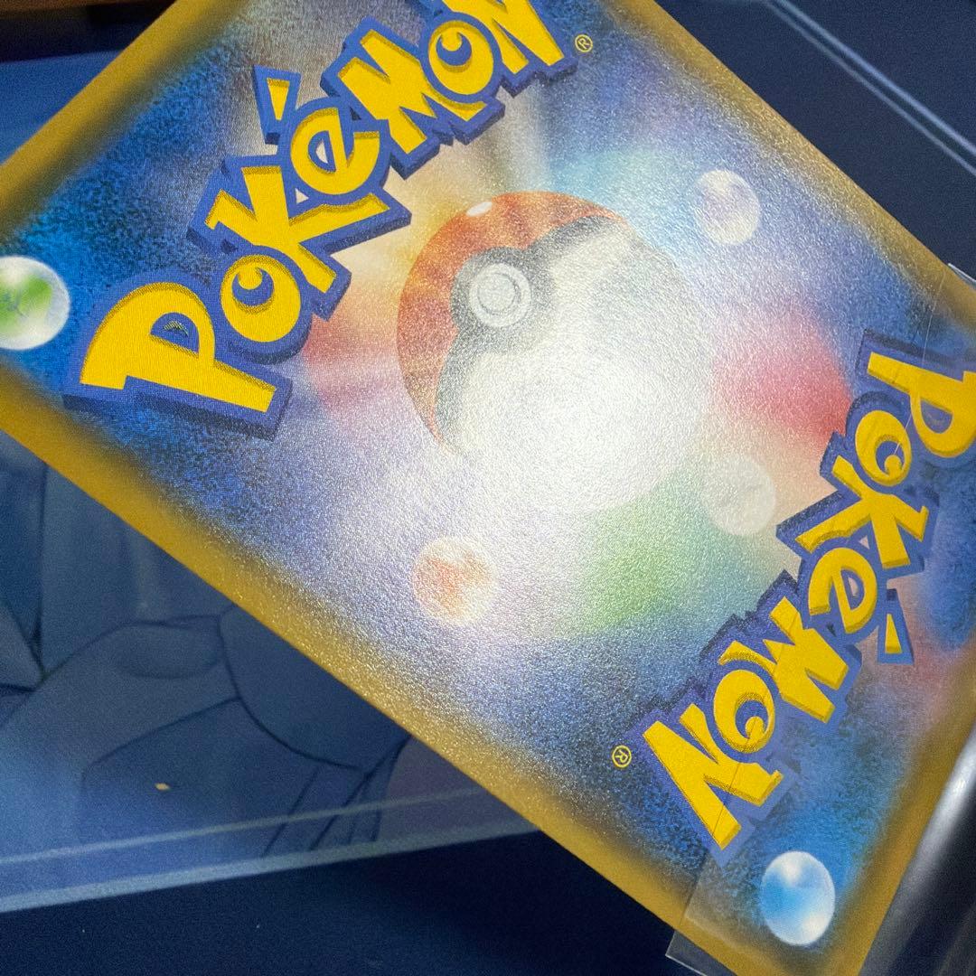 ポンチョを着たイーブイ（ブラッキー） PROMO SM-Pプロモ141/SM-P