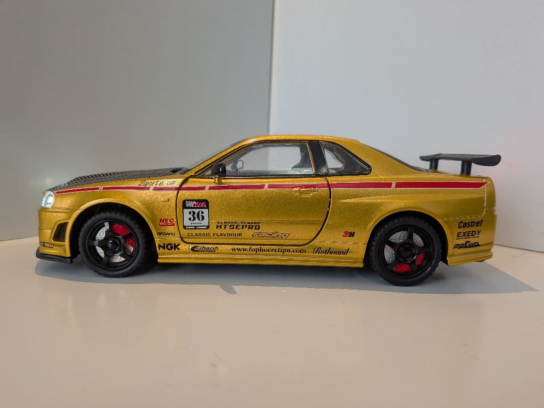 ​R34 GT-R 1/24 ミニカー ゴールド ハンドル連動 常時点灯 検品済