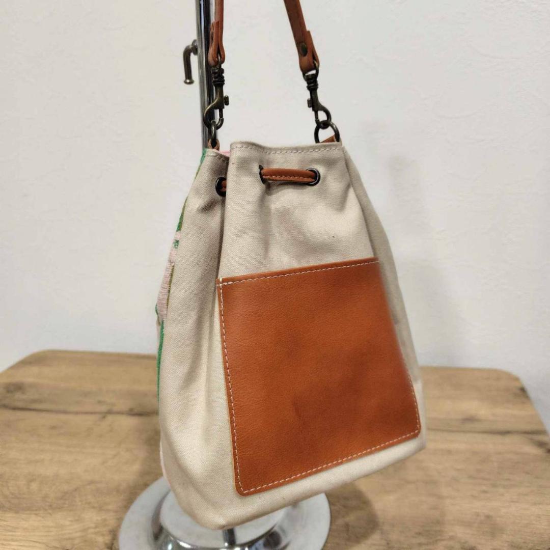 ミナペルホネン/thoroughbredサラブレットマスタード/巾着ポシェット