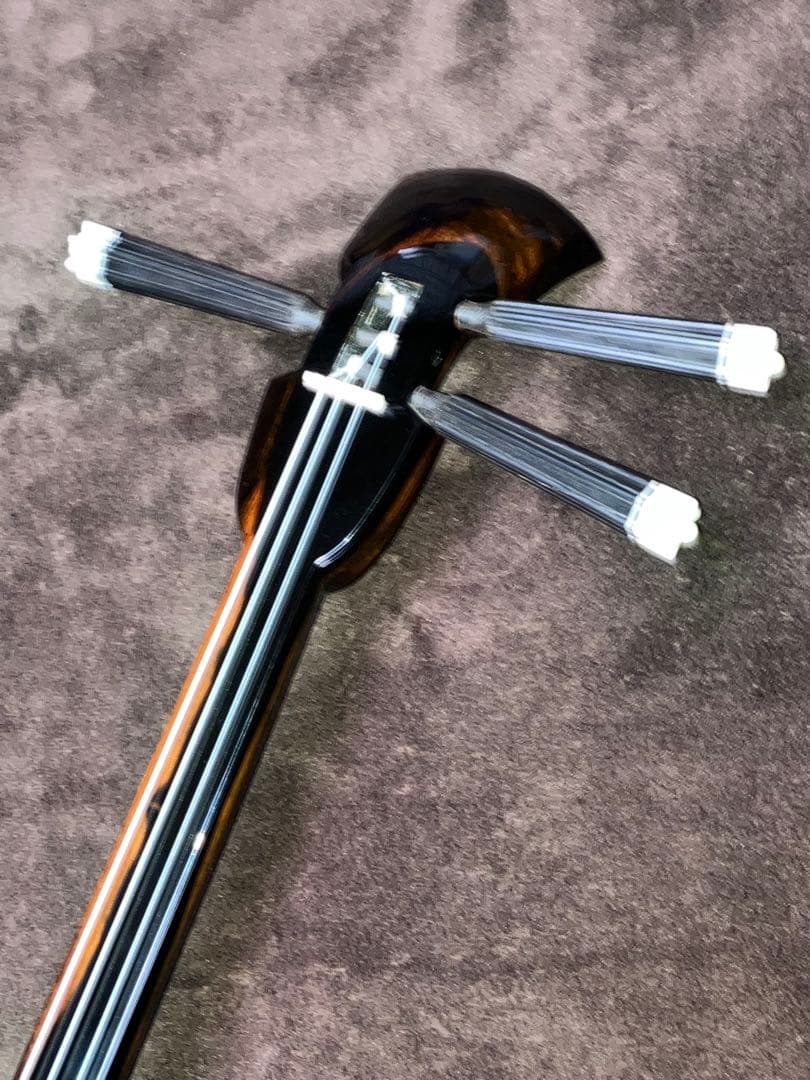 沖縄三線フィリピンエーマ￼(上質カミゲン黒木)与那城型本皮一枚張りスンチ塗の出品