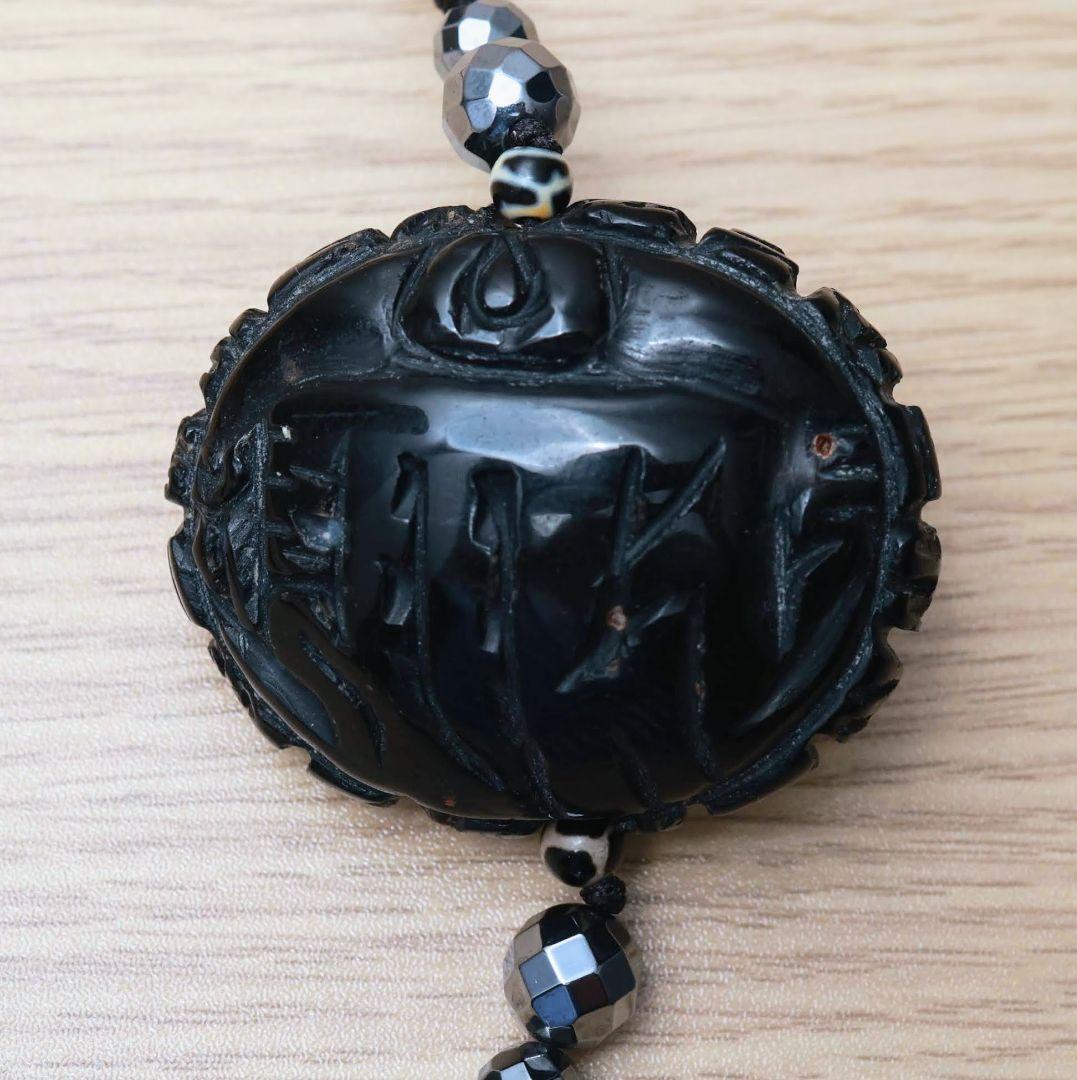 黒色の大粒羊眼板天珠ネックレス