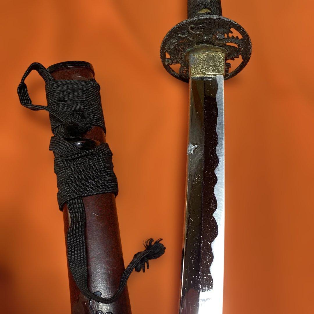 割安模造刀 黒柄 龍彫透し丸鍔 鳳凰図金口金尻小豆鞘