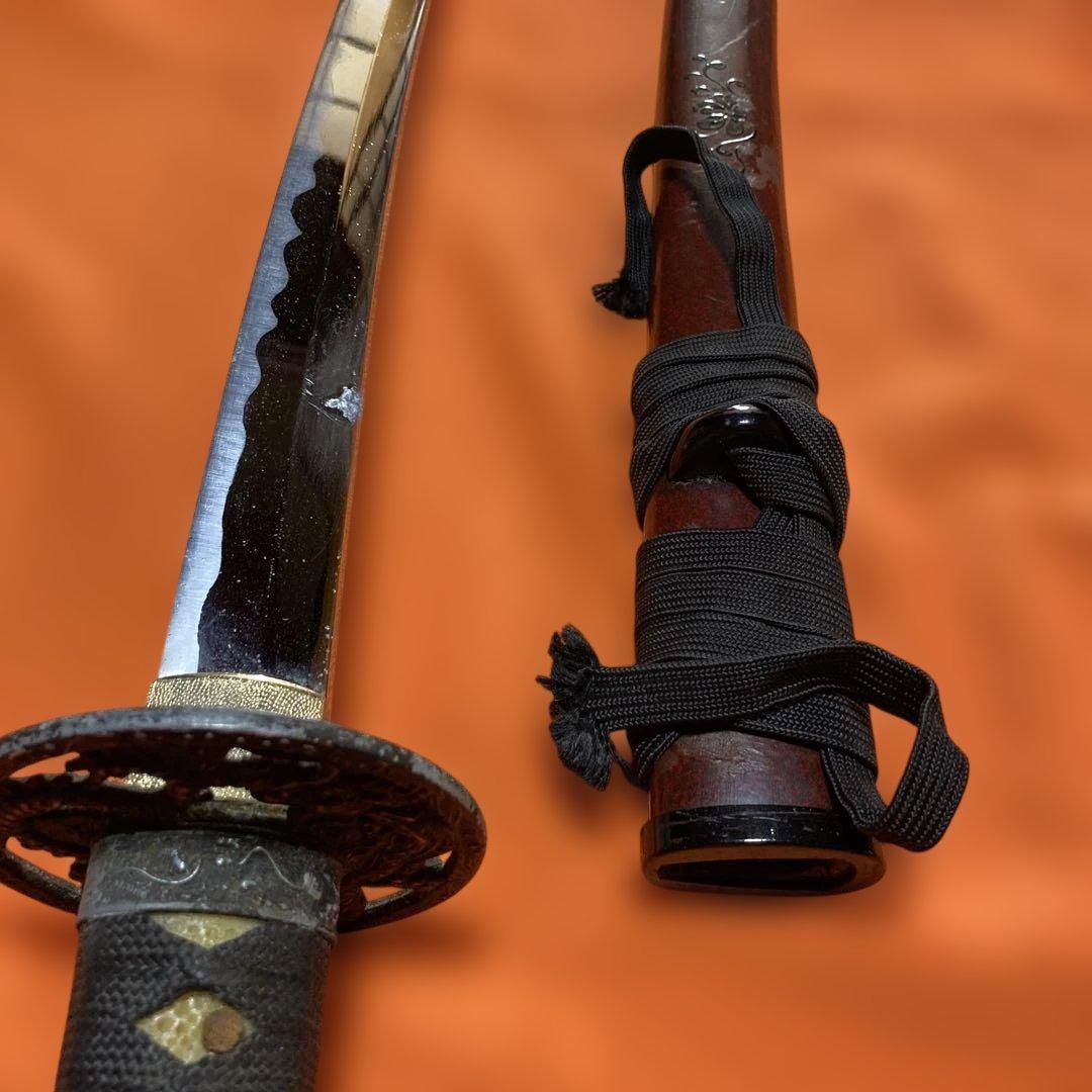 割安模造刀 黒柄 龍彫透し丸鍔 鳳凰図金口金尻小豆鞘