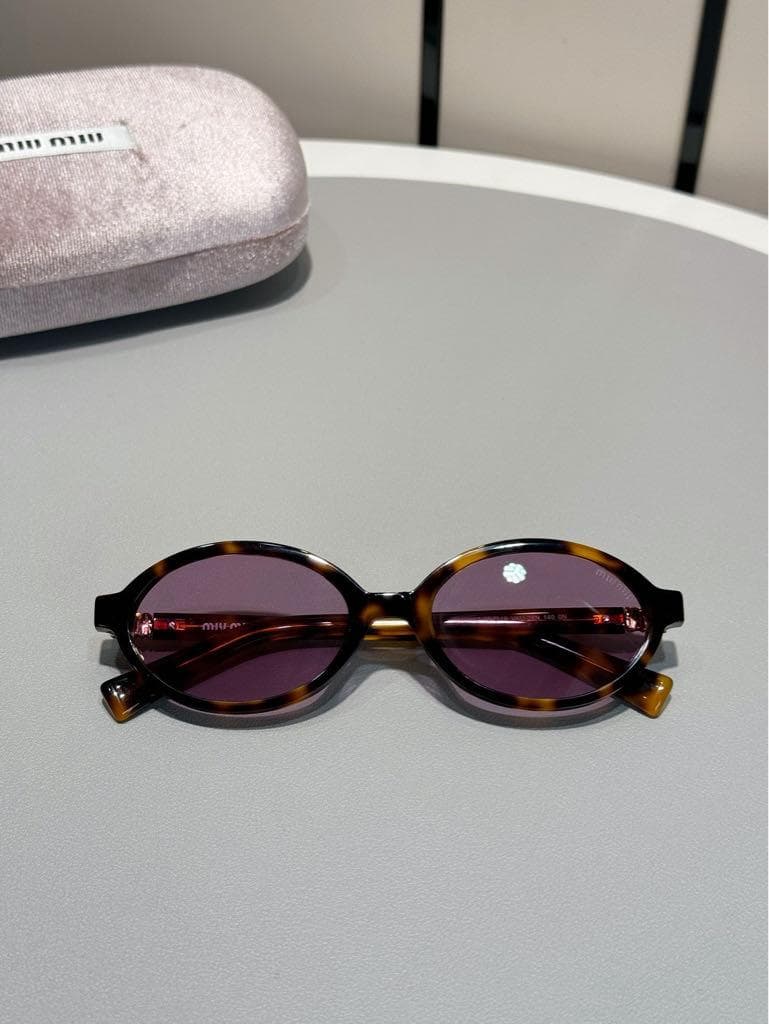 MIUMIU ロゴ サングラス レディース SMU04Z