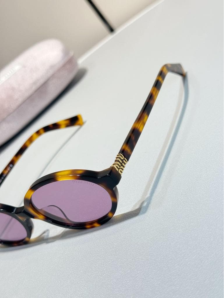 MIUMIU ロゴ サングラス レディース SMU04Z
