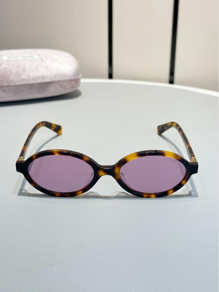 MIUMIU ロゴ サングラス レディース SMU04Z