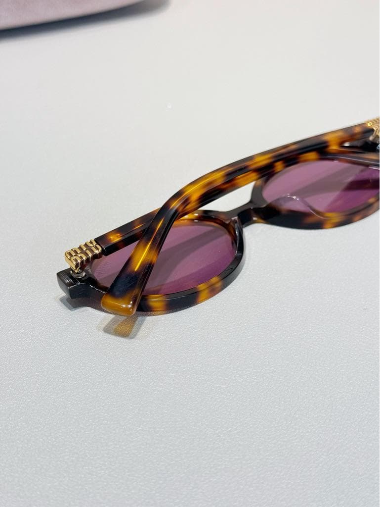 MIUMIU ロゴ サングラス レディース SMU04Z