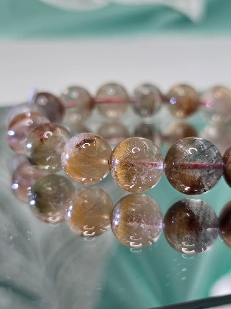 約11.2㍉サゲニティッククォーツブレス＆替えゴム＆ポーチ＆さざれ石(希望者