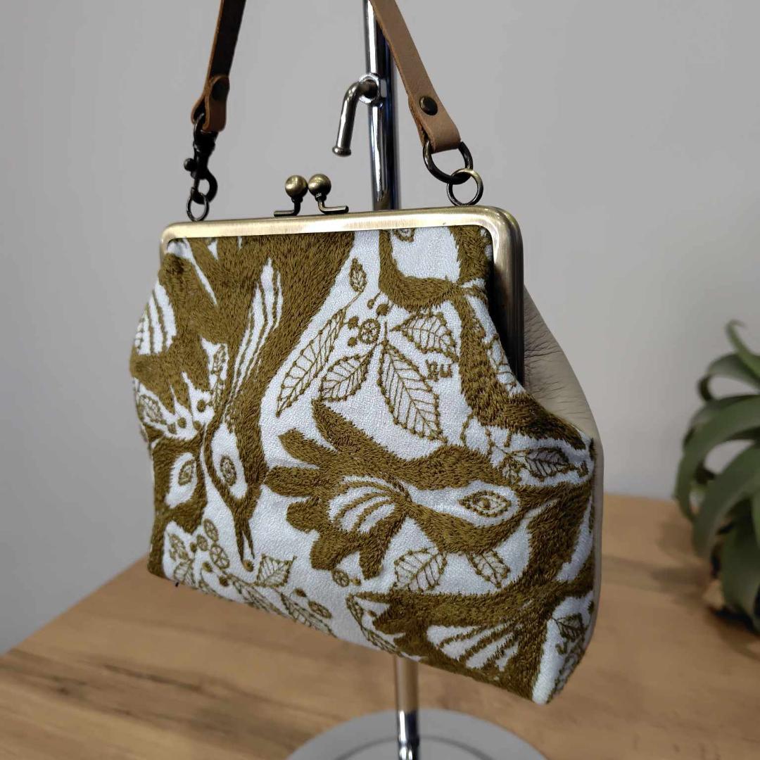 ミナペルホネン/carnival　カーニバルライトブルー/がま口マルチポーチ