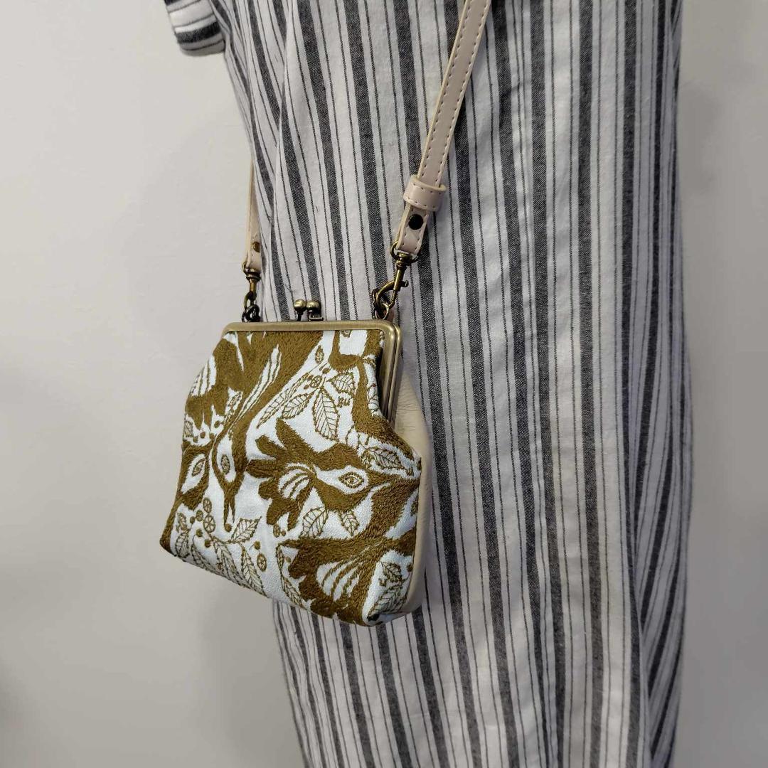 ミナペルホネン/carnival　カーニバルライトブルー/がま口マルチポーチ