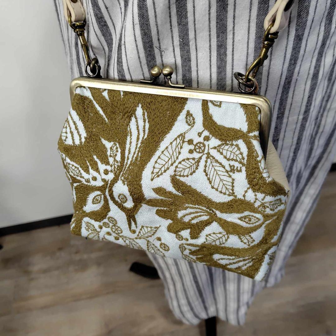 ミナペルホネン/carnival　カーニバルライトブルー/がま口マルチポーチ