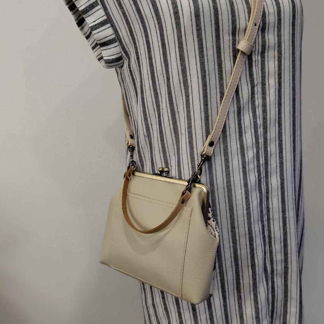 ミナペルホネン/carnival　カーニバルライトブルー/がま口マルチポーチ