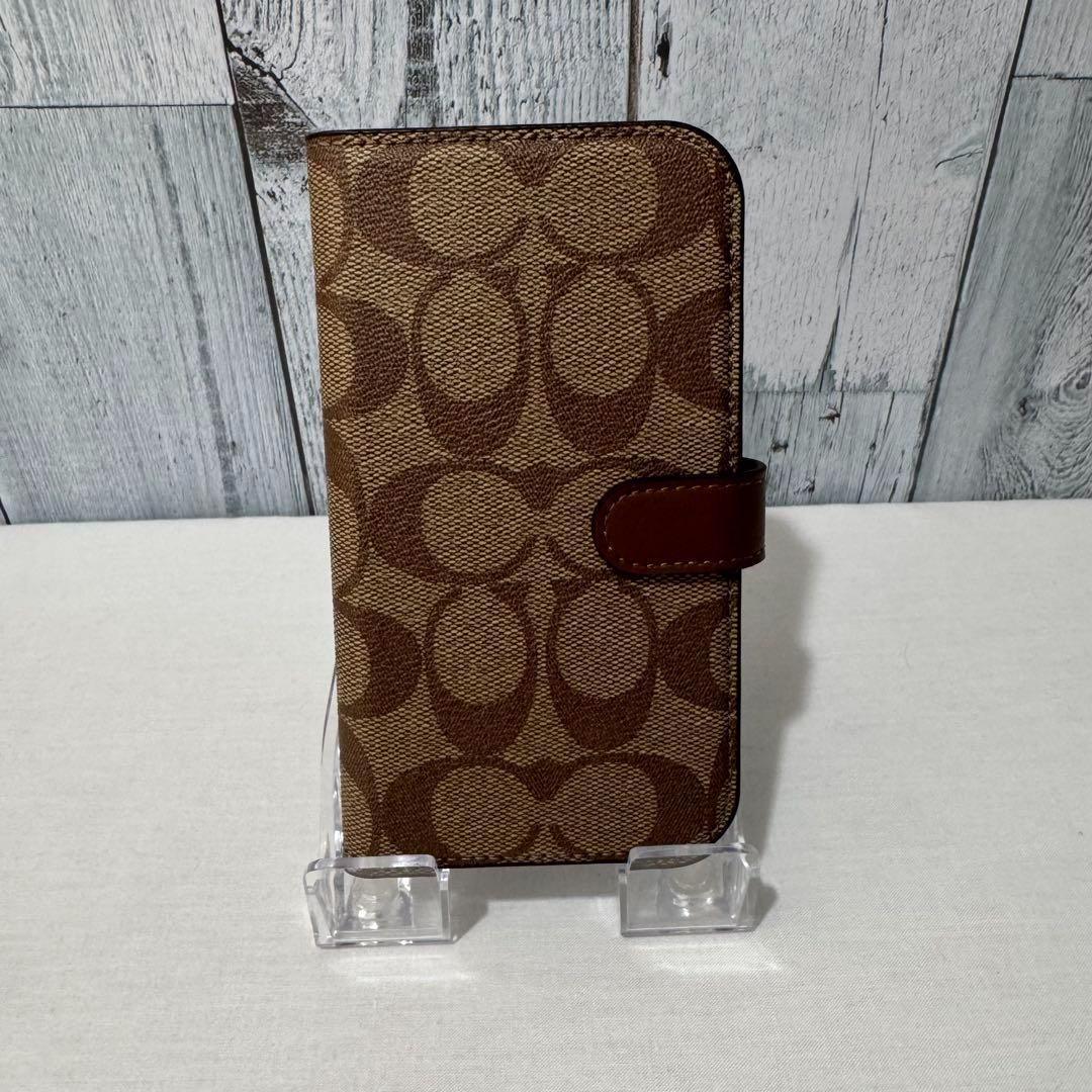 【新品】コーチcoach iPhone15Proケース手帳　カーキ　シグネチャー