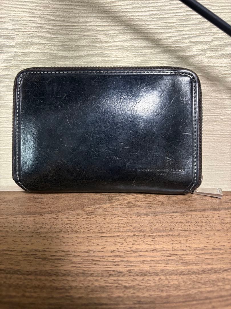 TAKEO KIKUCHI マルゴ セミ長財布 カード段9 カラー:クロ