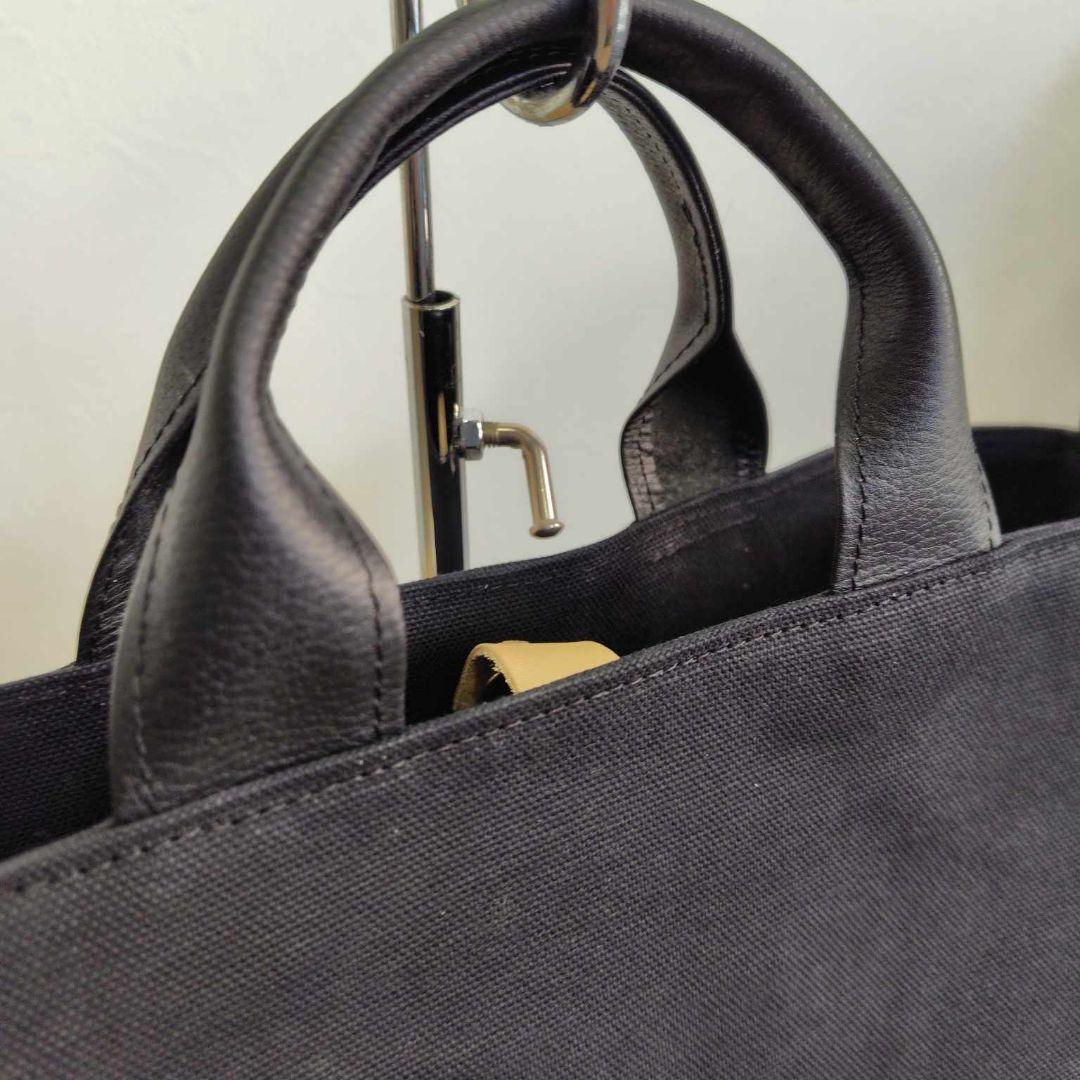 ミナペルホネン/フォレストウィングネイビー/がま口ポケット付きトート