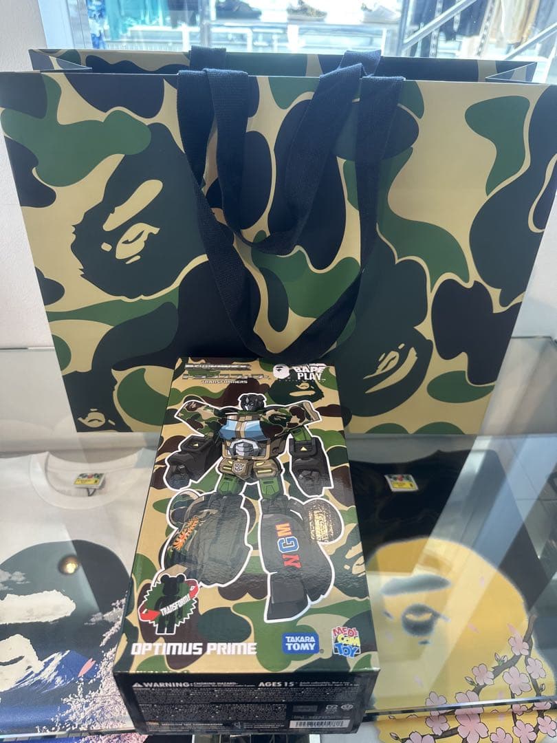 BAPE® X TRANSFORMERS X BE@RBRICK CAMO