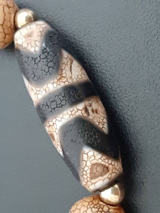 チベットジービーズ 西蔵天珠 至純天珠 火供龍紋九眼天珠虎牙天珠のブレスレット