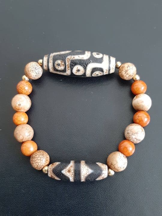 チベットジービーズ 西蔵天珠 至純天珠 火供龍紋九眼天珠虎牙天珠のブレスレット