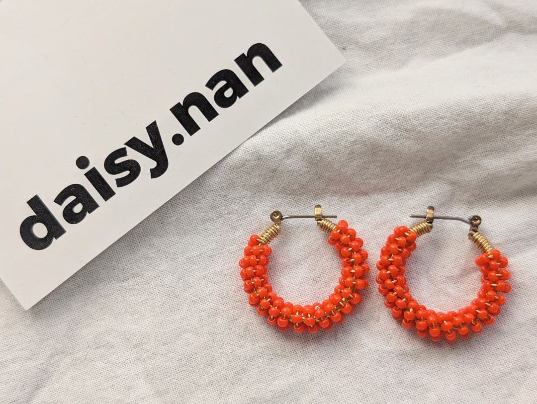 big orange✕goldピアス