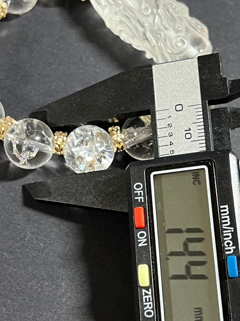 水晶の菩薩様両面彫り天珠と虹入りアイリスクォーツのブレスレット