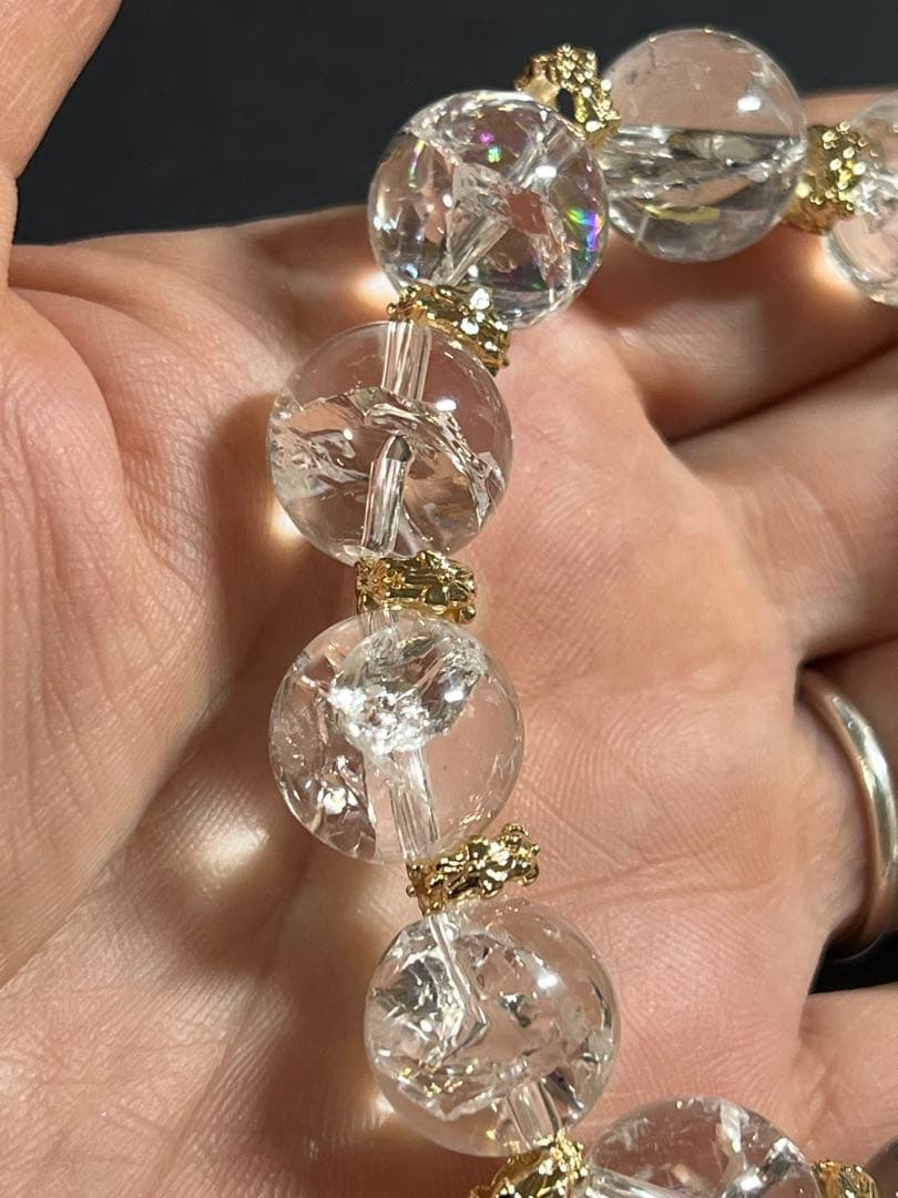 水晶の菩薩様両面彫り天珠と虹入りアイリスクォーツのブレスレット