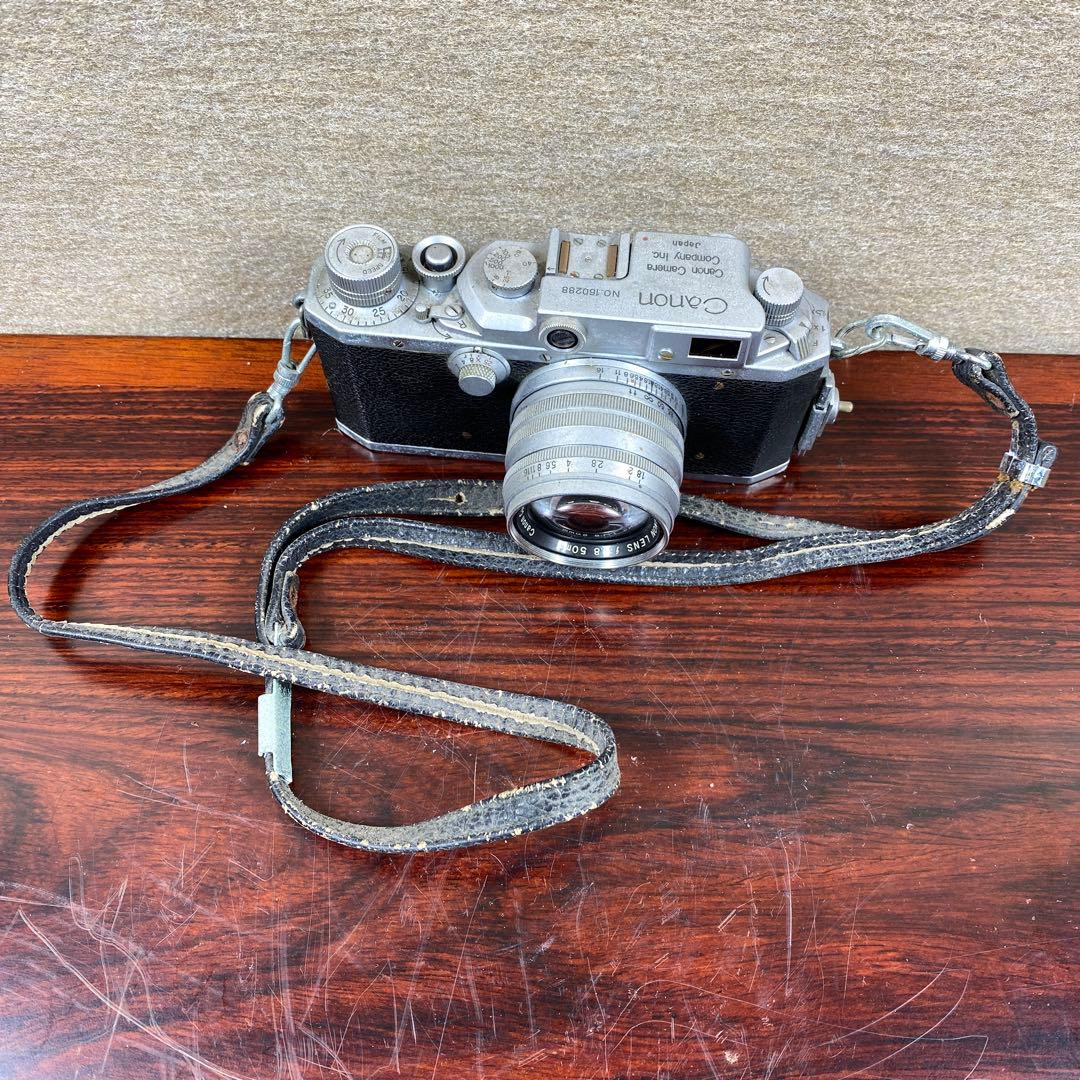 キャノン フィルムカメラ No.160288レザーケース付動作未確認 ジャンク品