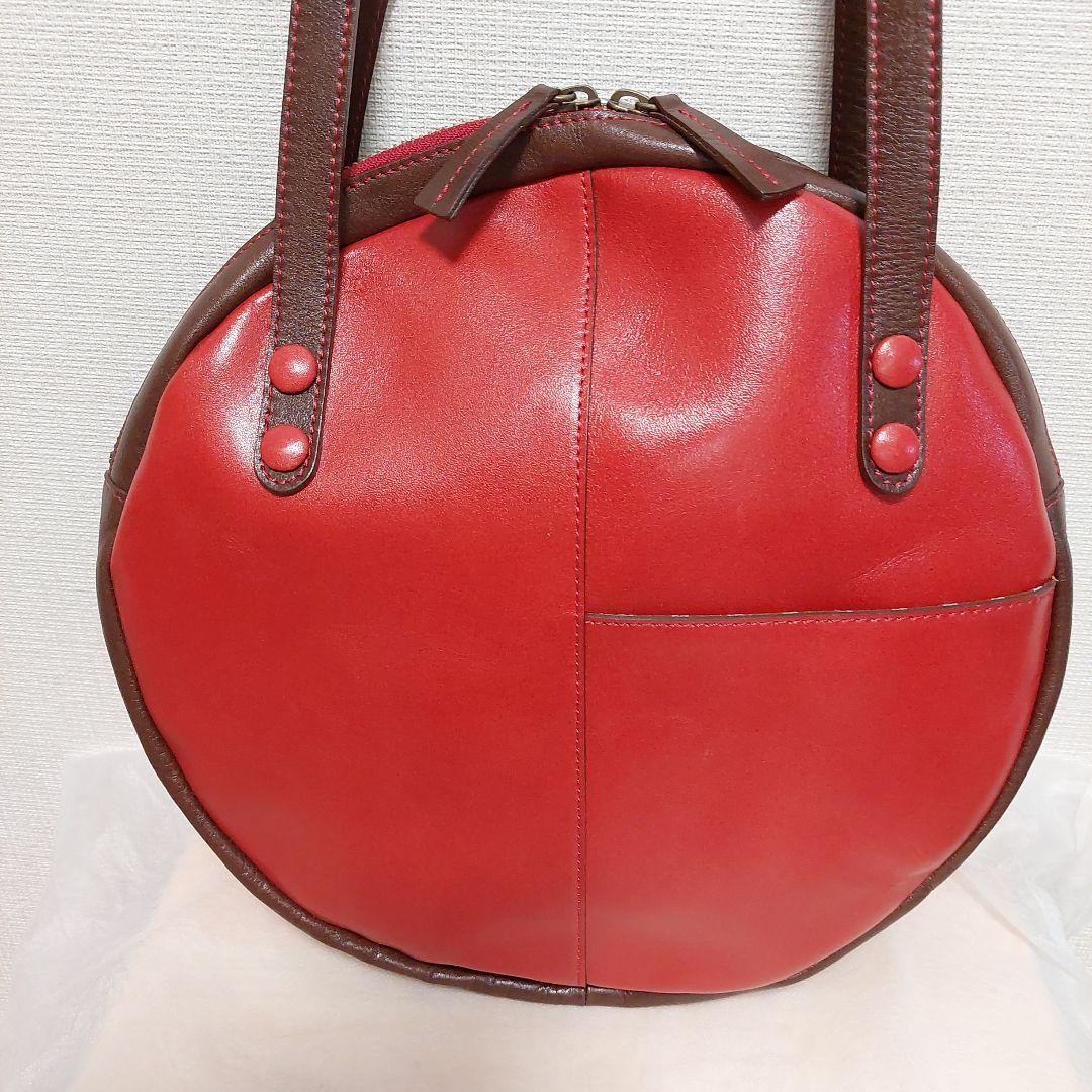 未使用 国産メーカーda--na 赤い円形レザー ハンドバッグ