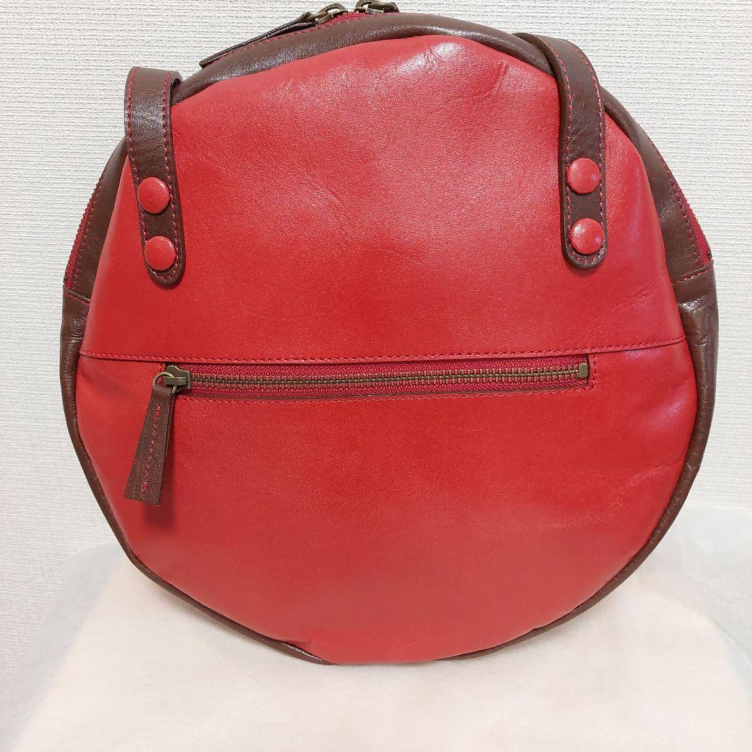 未使用 国産メーカーda--na 赤い円形レザー ハンドバッグ