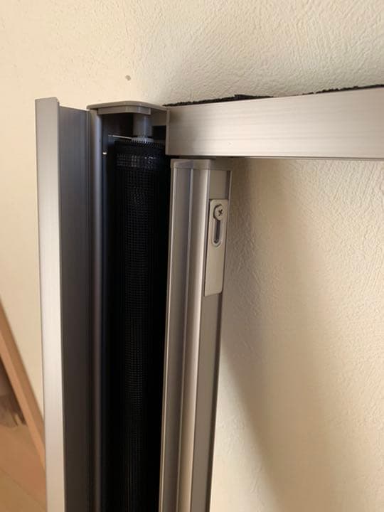 トステム 縦滑り出し窓用網戸