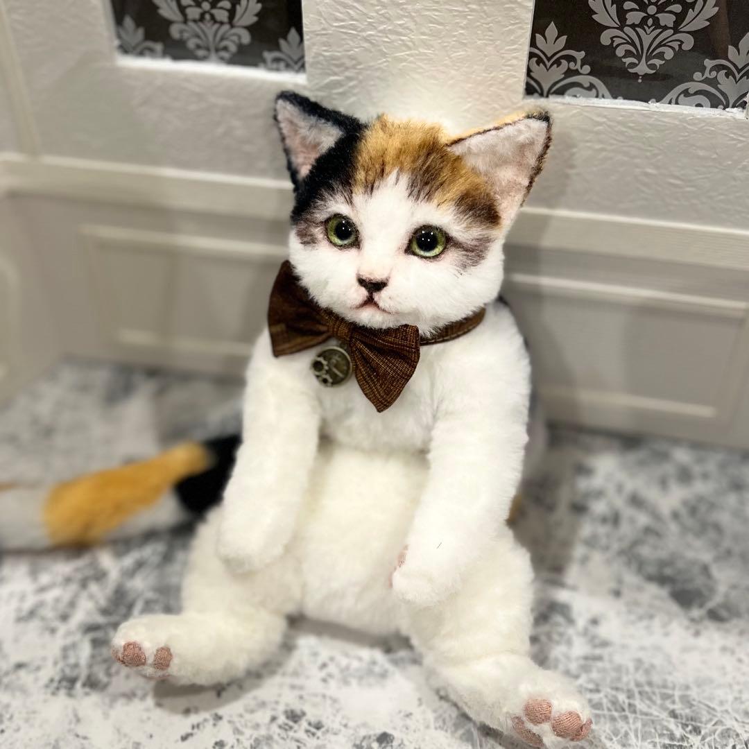連れ歩き三毛猫ぬいぐるみ