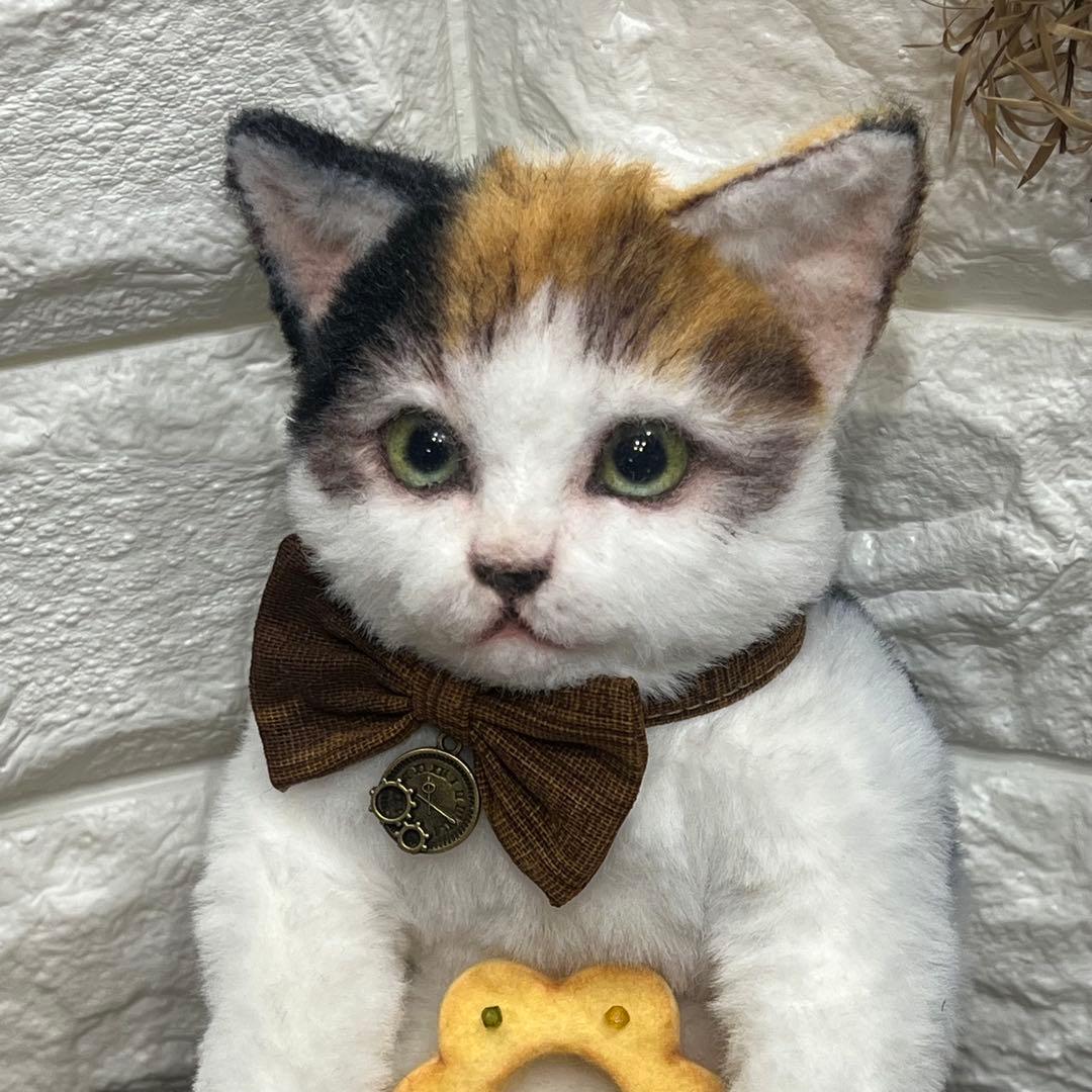 連れ歩き三毛猫ぬいぐるみ