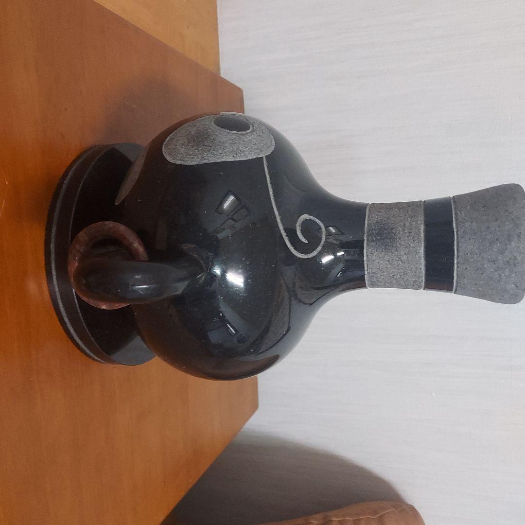 顔の形の黒色石製品置物25㎝