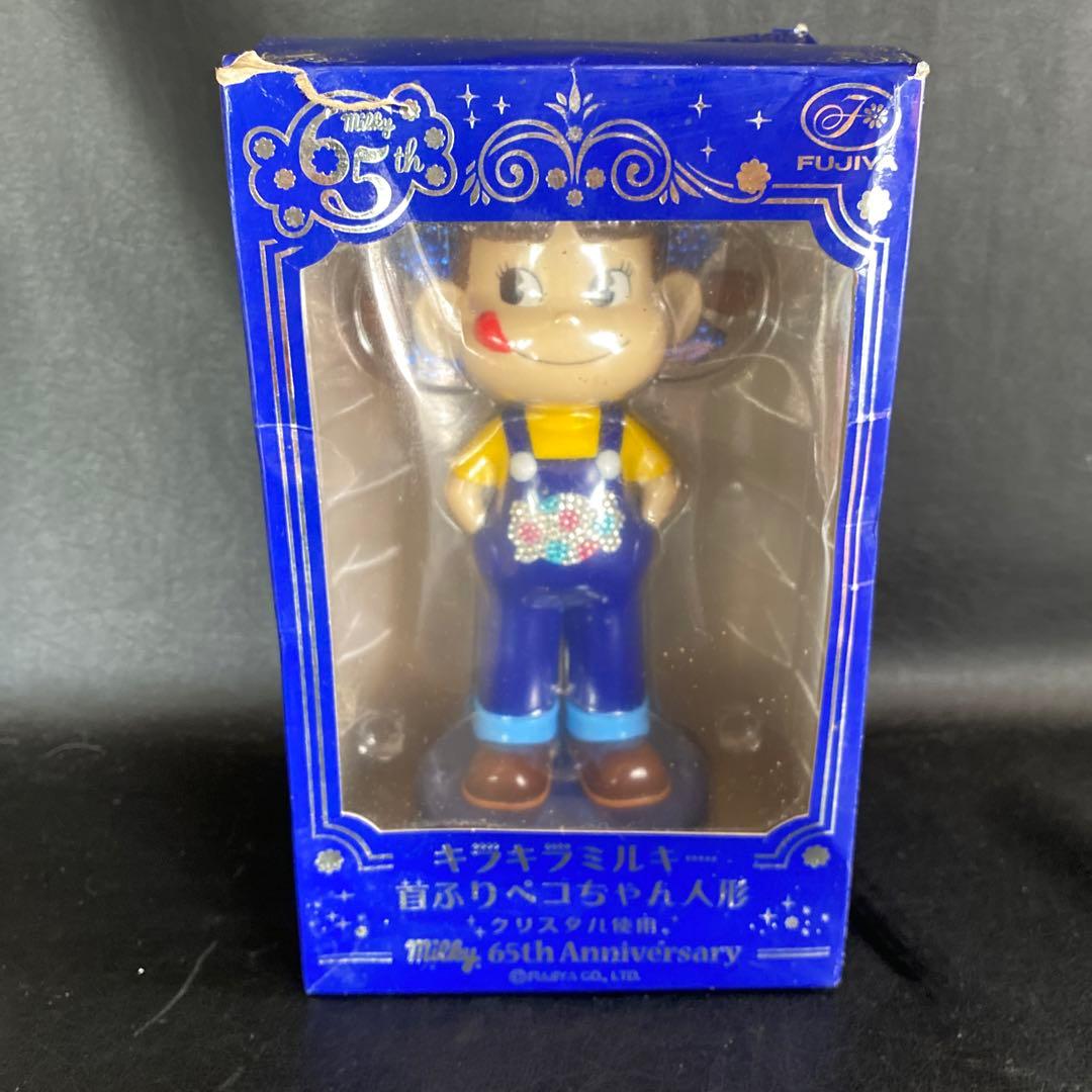 キラキラミルキー首ふりペコちゃん 人形クリスタル使用65周年記念人形
