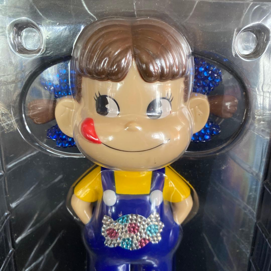 キラキラミルキー首ふりペコちゃん 人形クリスタル使用65周年記念人形