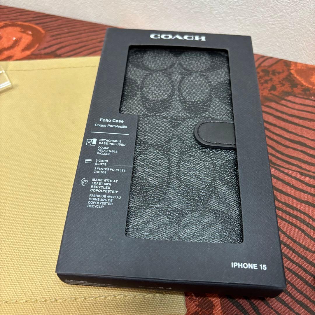 美品 COACH コーチ IPHONE15 フォリオ・シグネチャー キャンバス